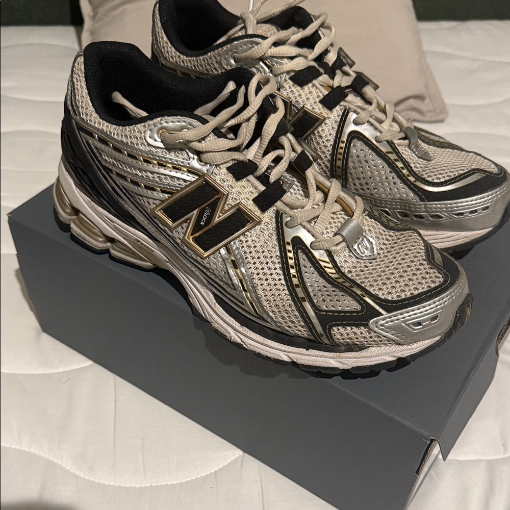 New Balance Women's Metallic Gold and Black Sneakers